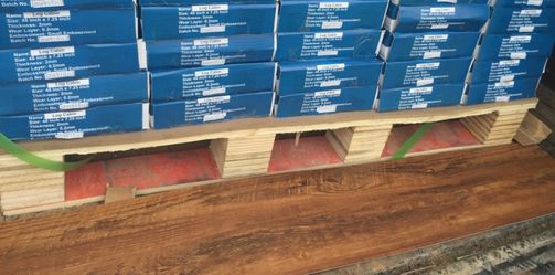 Lots of boxes of vinyl plank