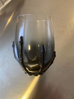 $25 · Set of 8...19oz Stemless wine glass with black skeleton hand. 2 sets of 8 available.