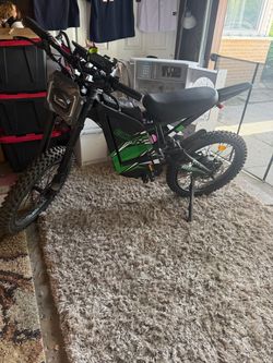 Electric dirt bike. 4500w 40 mph <100 total miles driven.