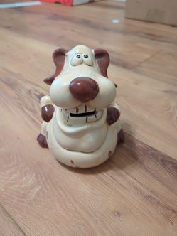 Porcelain dog piggy bank