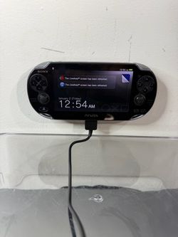 Sony PS Vita PCH-1001 OLED Handheld Console + Assassin’s Creed Game