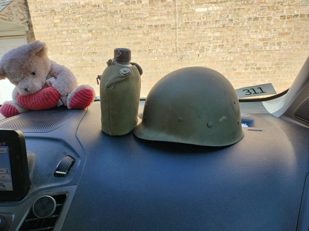 soldier helmet and water bottle  