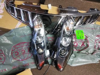 BRAND NEW HEADLIGHT AND GRILL