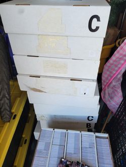 Sixteen boxes of sports cards MLB NFL NHL