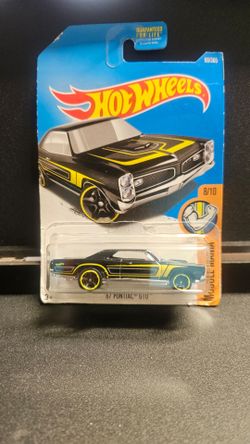 Hot Wheels Black Yellow 1967 Pontiac GTO Muscle Mania

Package slightly damaged in storage