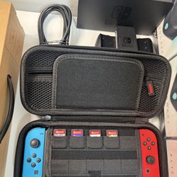 Nintendo Switch + 4 Games ( no charger )