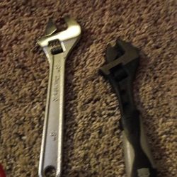 two adjustable wrenches