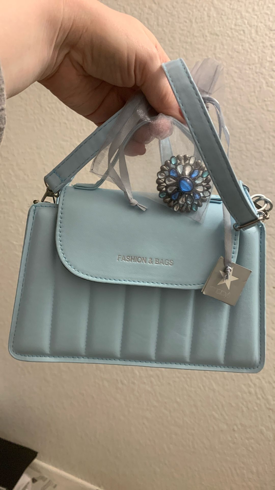 Macy’s. Ring   ———-> Matched  With Cross Bag