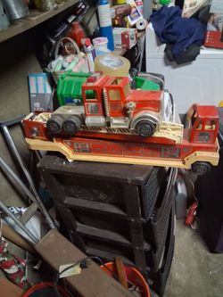 2 antique firetruck toys