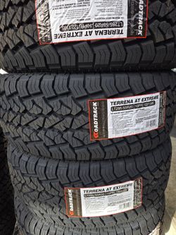 (4) 285/55r20 ROADTRACK A/T 10-ply LT E Rated 285 55 20 Inch