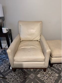 Italian cream, leather chair, and ottoman