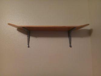 Skateboard shelf