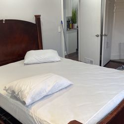 queen size bed with mattress and dresser