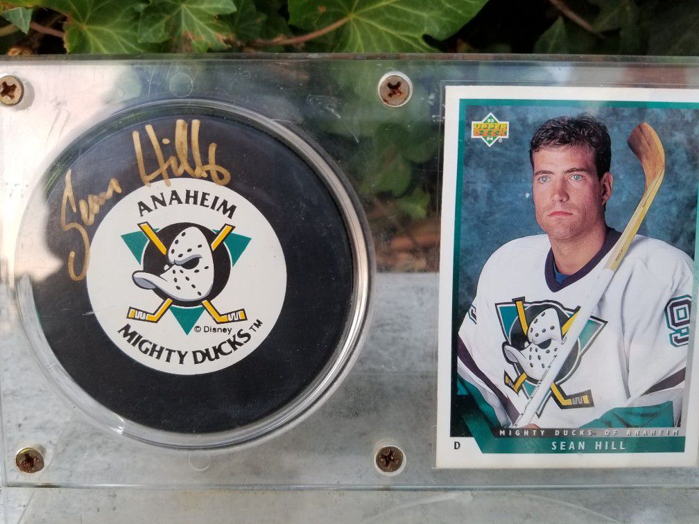 Sean Hill Rookie card with autographed official puck