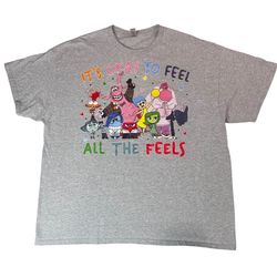 Gildan “It’s Okay to Feel All the Feels” tee — size not tagged but estimated XL