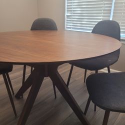 Round dining table with chairs