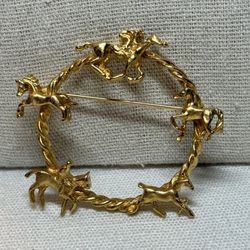 Horse and Rider Circular Gold Tone Brooch