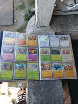 There some Charizard on folder. All holo 260 Cards x $$$ plus folder. $600! Firm all  Pokémon or trade all for iPhone pro max PS5 Pro Switch 2 z1 extr