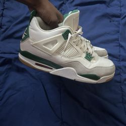 Green nd White Jordan 4’s