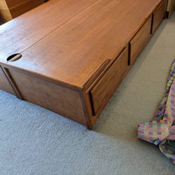 Free- queen size wooden platform bed frame with storage drawers.