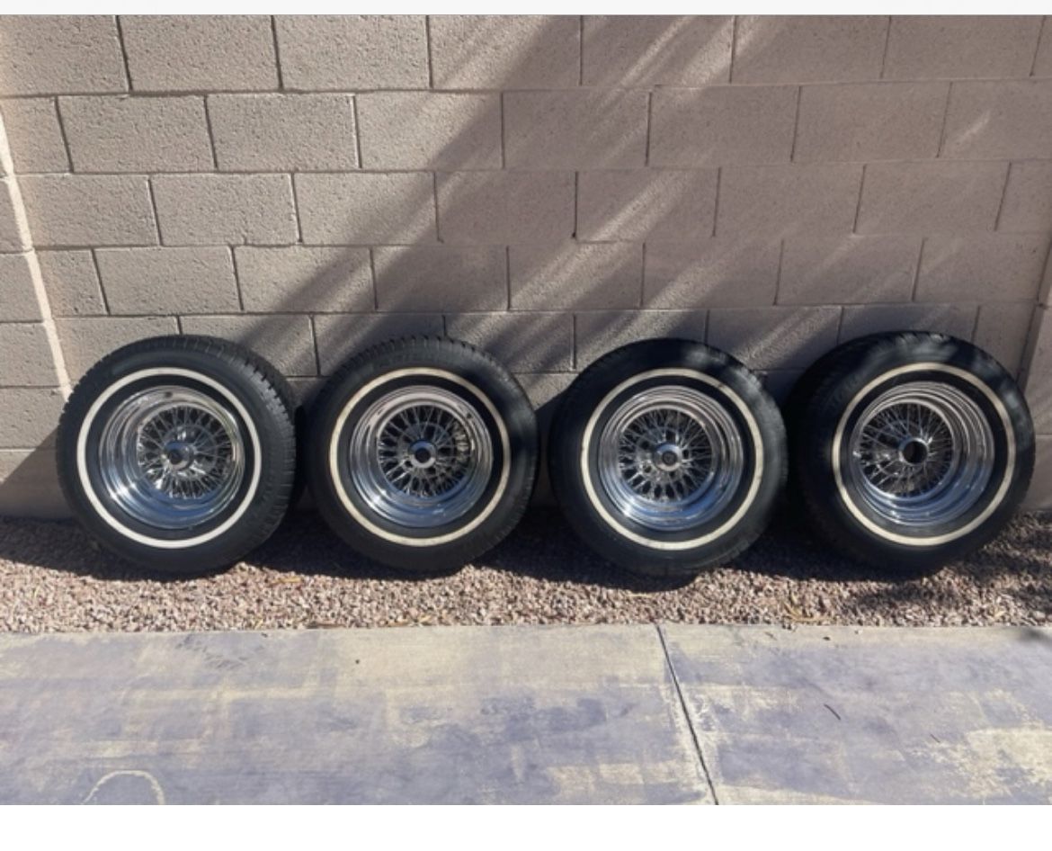 Four (4) 72 spoke cross lace chrome rims with tires. for Sale in ...