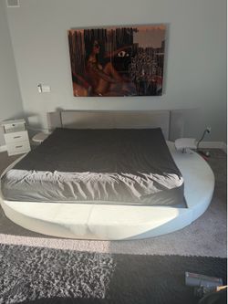 built inside tables King size white circle bed frame with built-in side tables