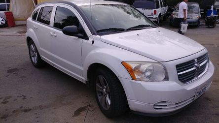 2010 dodge caliber 1300 down rest paymentes español