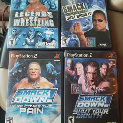4 ps2 games smackdown here comes the pain,shut you're mouth,just bring it,Legends of wrestling