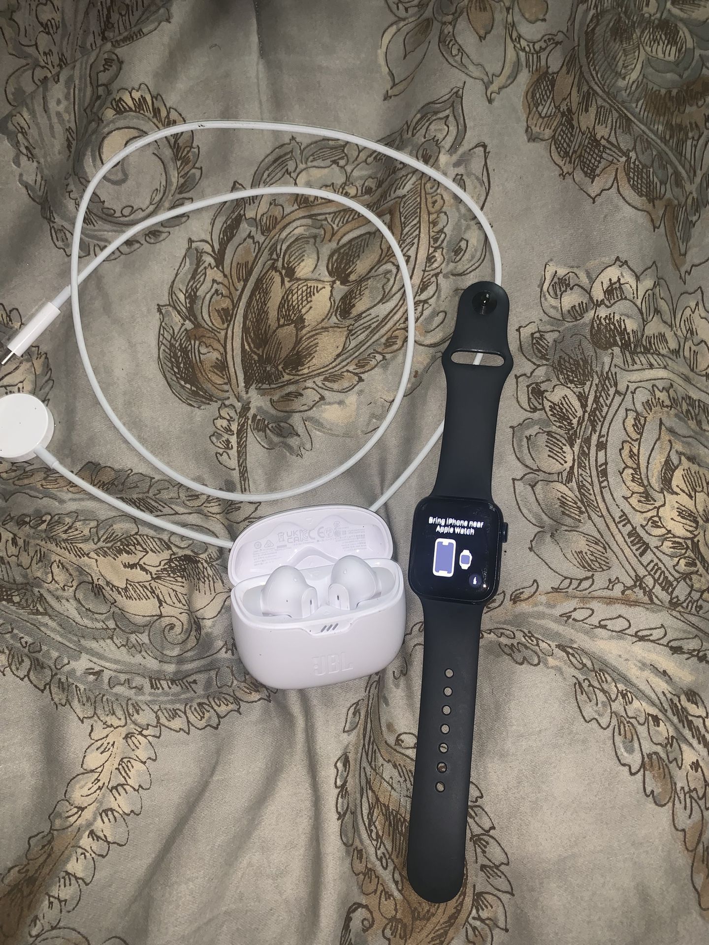 Apple Watch & JBL Headphones.