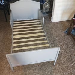 Clean gray children's bed frame and mattress asking $80 cash must pick up Broadway and apache buckeye az cash only pls can help load as well 👍