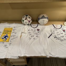 1999 USA Women’s World Cup Signed Tees And Balls. 