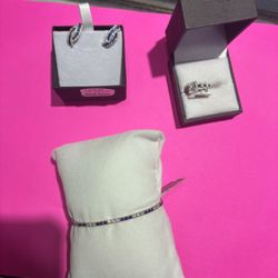 Ring, Bracelet And Earrings. 14k White Gold 