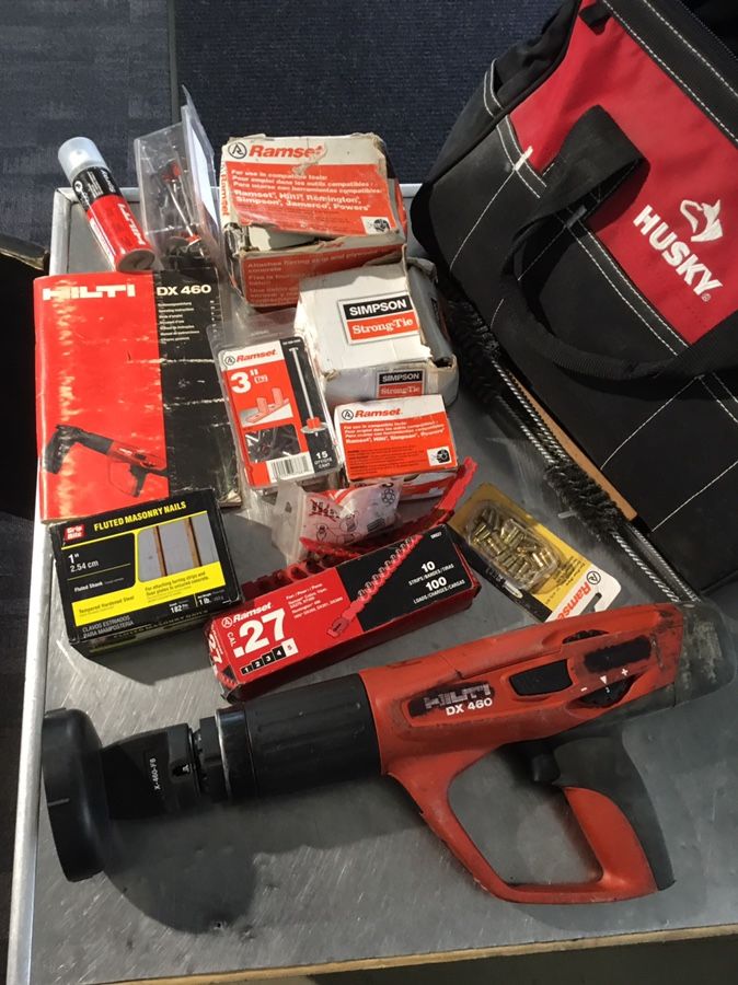 Hilti DX460 Nail Gun w/ bag, misc. nails, cleaning brushes, lubricant, protective cap and manual