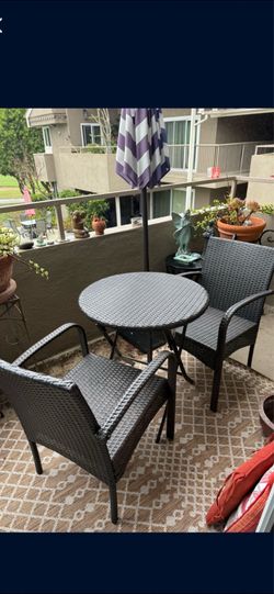 Patio table and two chairs