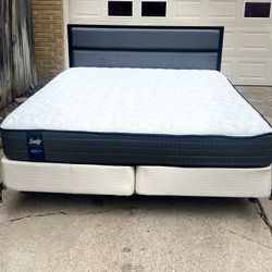 I am selling a metal frame king bed with backrest 2 box spring Sealy brand mattress practically new $500 for all home delivery available for an extra 