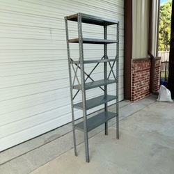 Metal Shelf with 6 shelves. Great condition  36 inch wide 85 inches tall 12 inches deep  PICK UP IN DEER PARK 77536