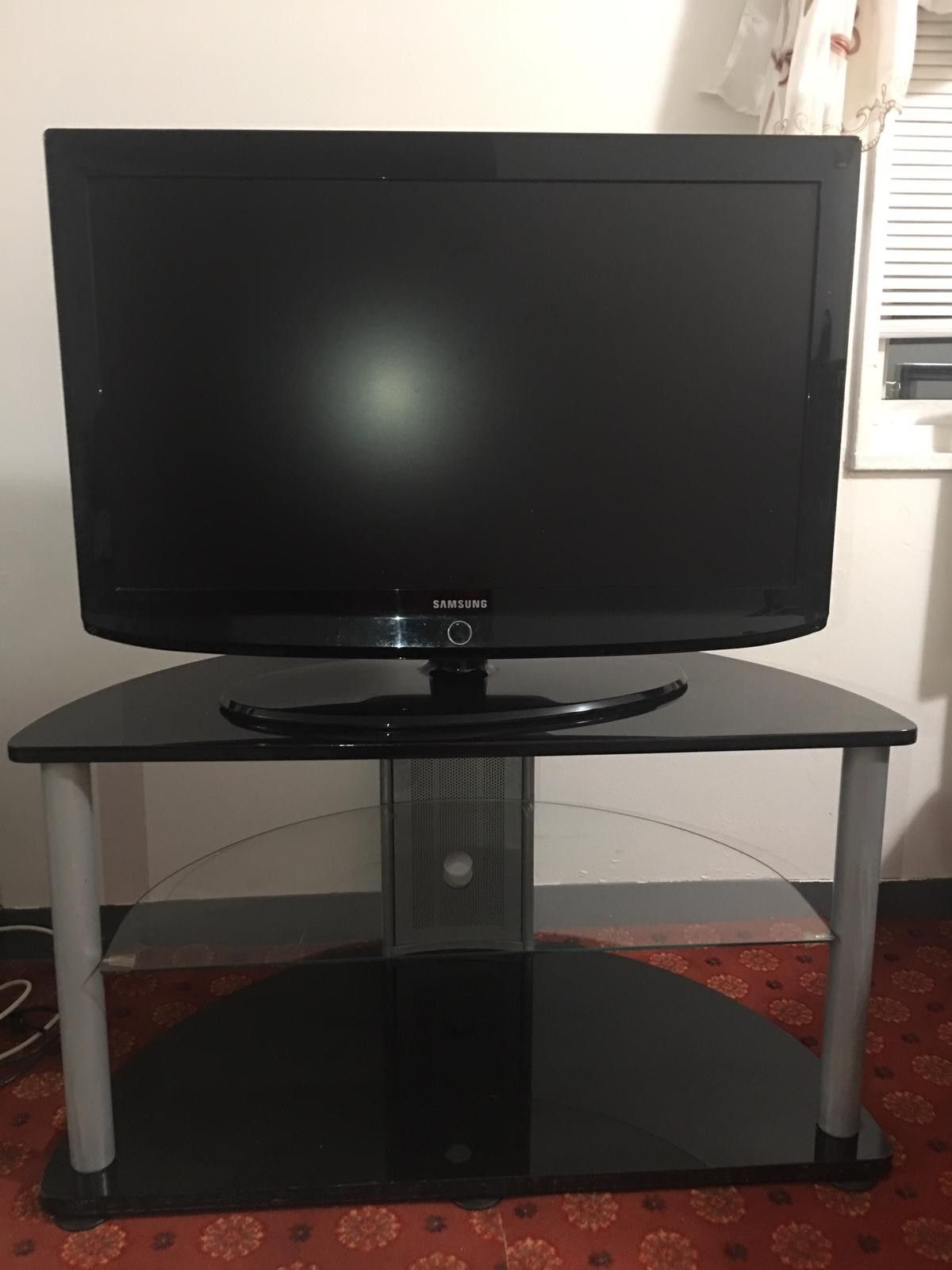 SAMSUNG 36" tv plus tv trolley for $50both