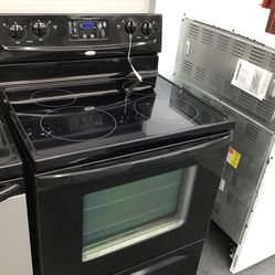 Whirlpool 4 burner Glass Top Range. 1 year Warranty 