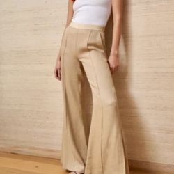 La Ligne Lizzie Pants Size 12  Retail $300 1 pant leg has a little dirt stain. On inside. It was hanging and got a little Dirty. 