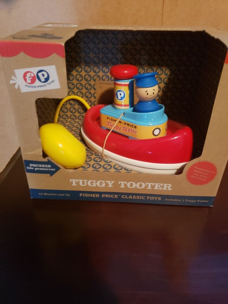 Tuggy tug boat toy