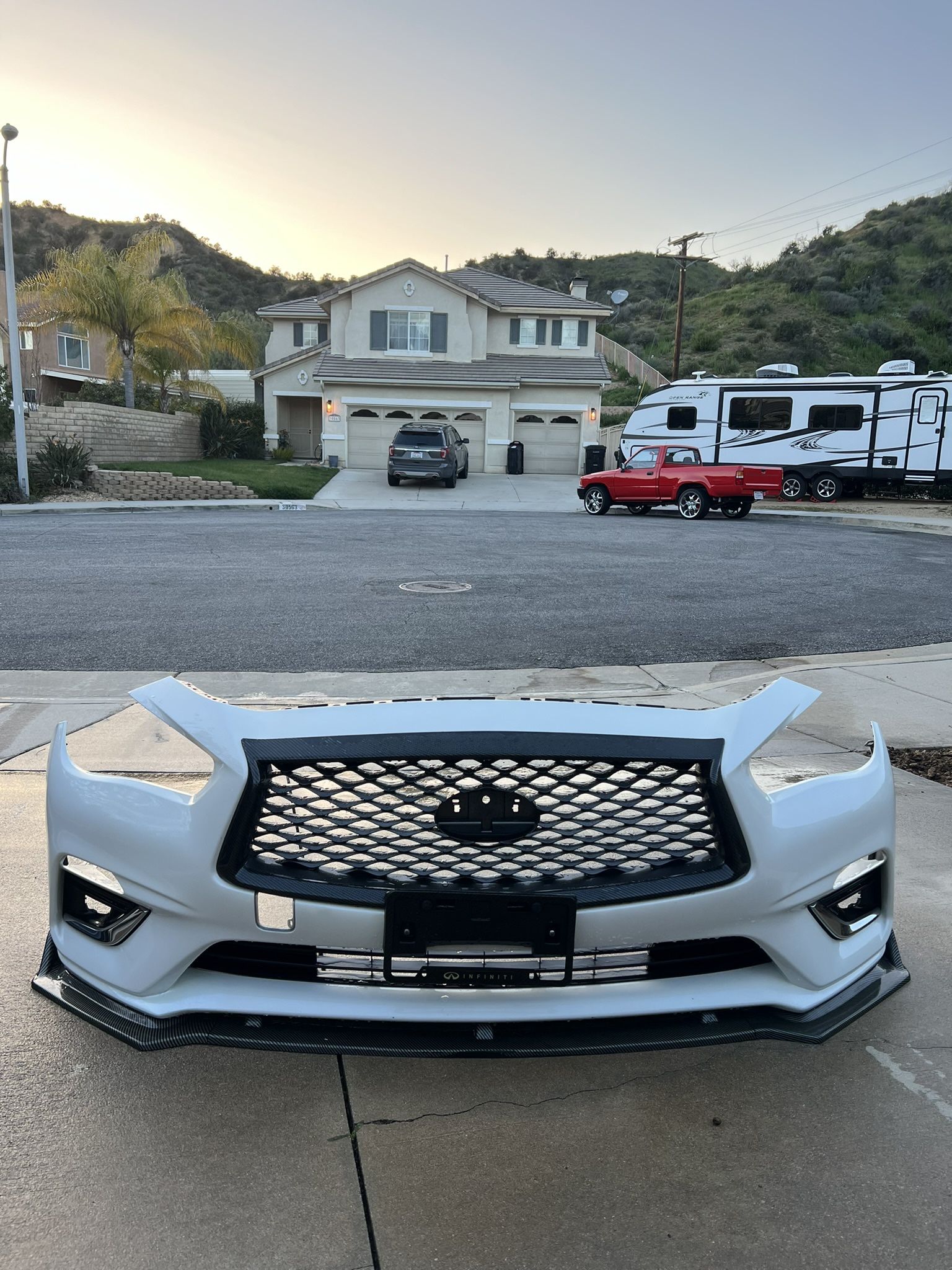 OEM Pearl White Infiniti Q50 Front Bumper