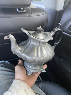 Sterling or pewter tea pot