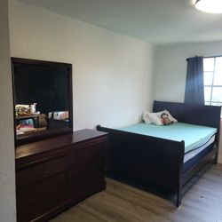 Bed And Dresser With Mirror