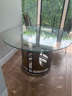 Glass dining room table w/4 chairs