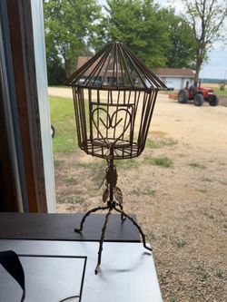 Vintage round metal Victorian style bird cage Gold Metal Leaves. The pads on 3 of legs fell off so it wobbles a tad