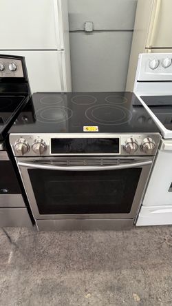 SAMSUNG 31” SLIDE IN ELECTRIC STOVE