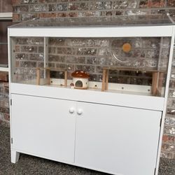 Hamster cage with storage cabinet (comes with accessories) hamster wheel, water dispenser and others