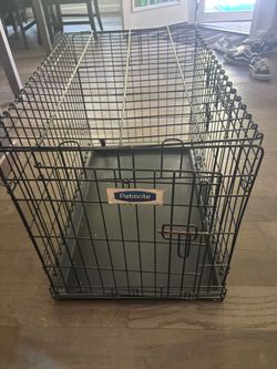 Used dog crate for small to medium dog