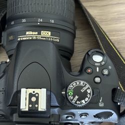 Nikon D5100 DSLR Camera with 18-55mm lens
