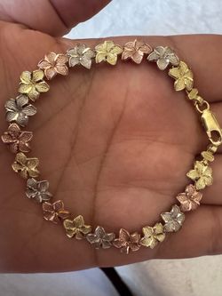 10k gold flor hawaiiana 3 oros muy bella nueva